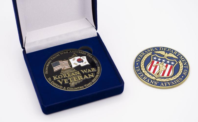 Korean War Veteran commemorative coins presented at the recognition ceremony. (Nebraska Department of Veterans' Affairs)